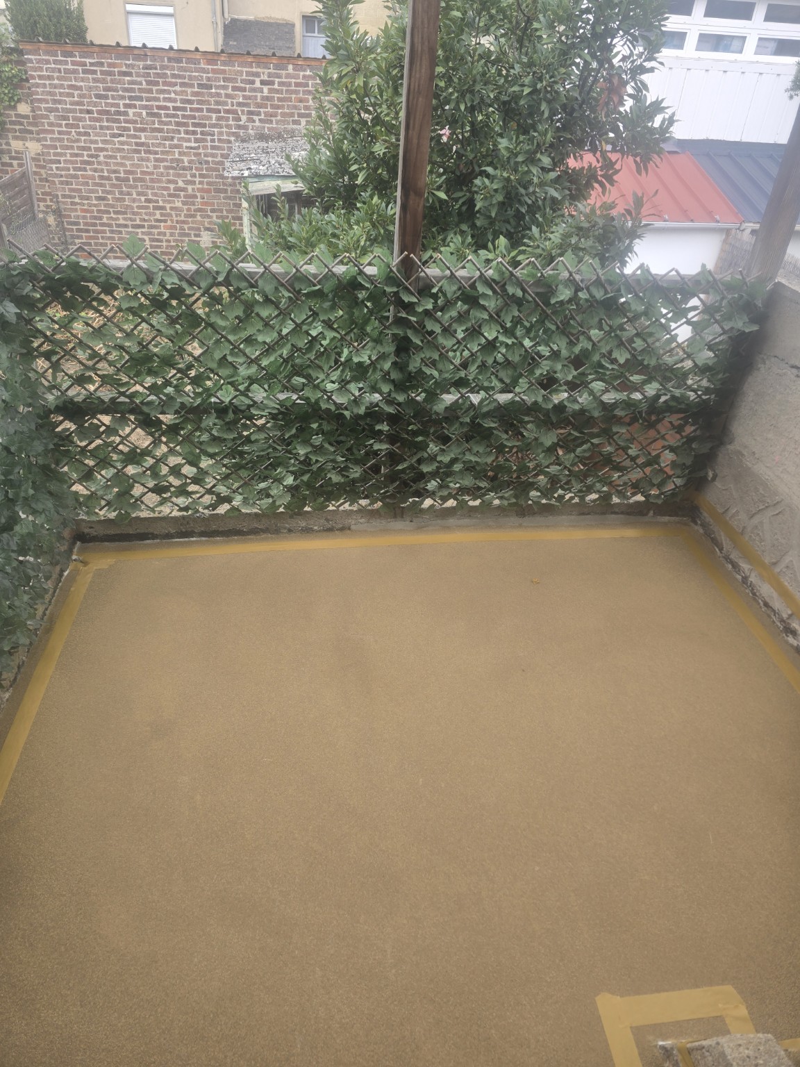 Terrasse pendant l’application du système d’étanchéité liquide